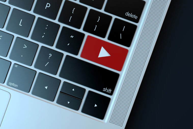 Youtube icon on laptop keyboard. Technology concept 18597